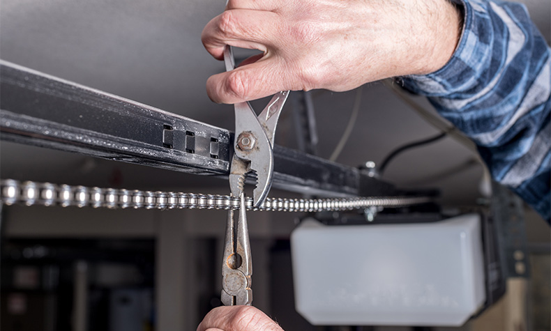 fixing garage door opener chain